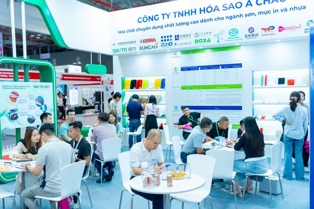 Visitors meeting exhibitors at Coatings Vietnam